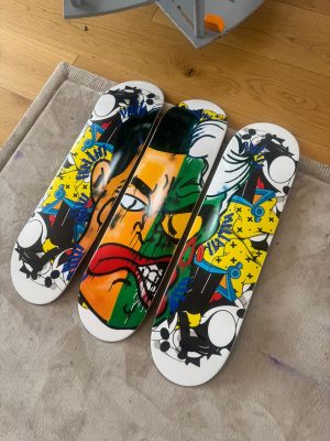 3 skateboards by Slawn and Opake